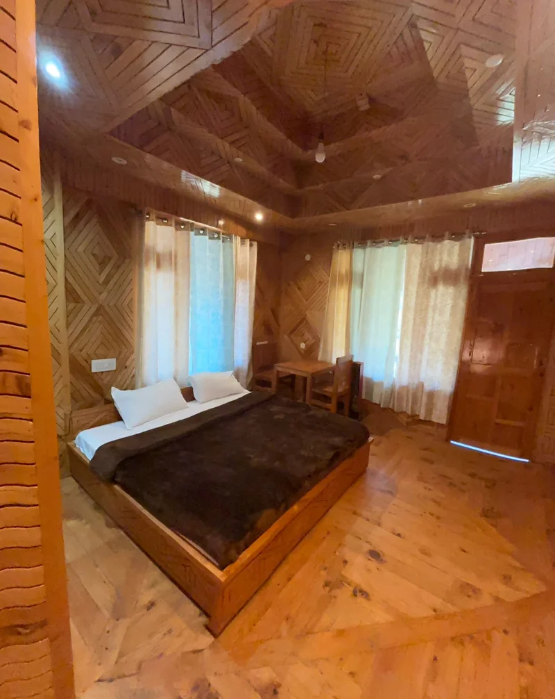Luxury Jacuzzi Room at Emberwood Jibhi - Premium honeymoon suite